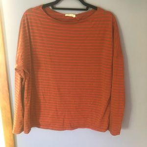 Red and brown striped long sleeve shirt.